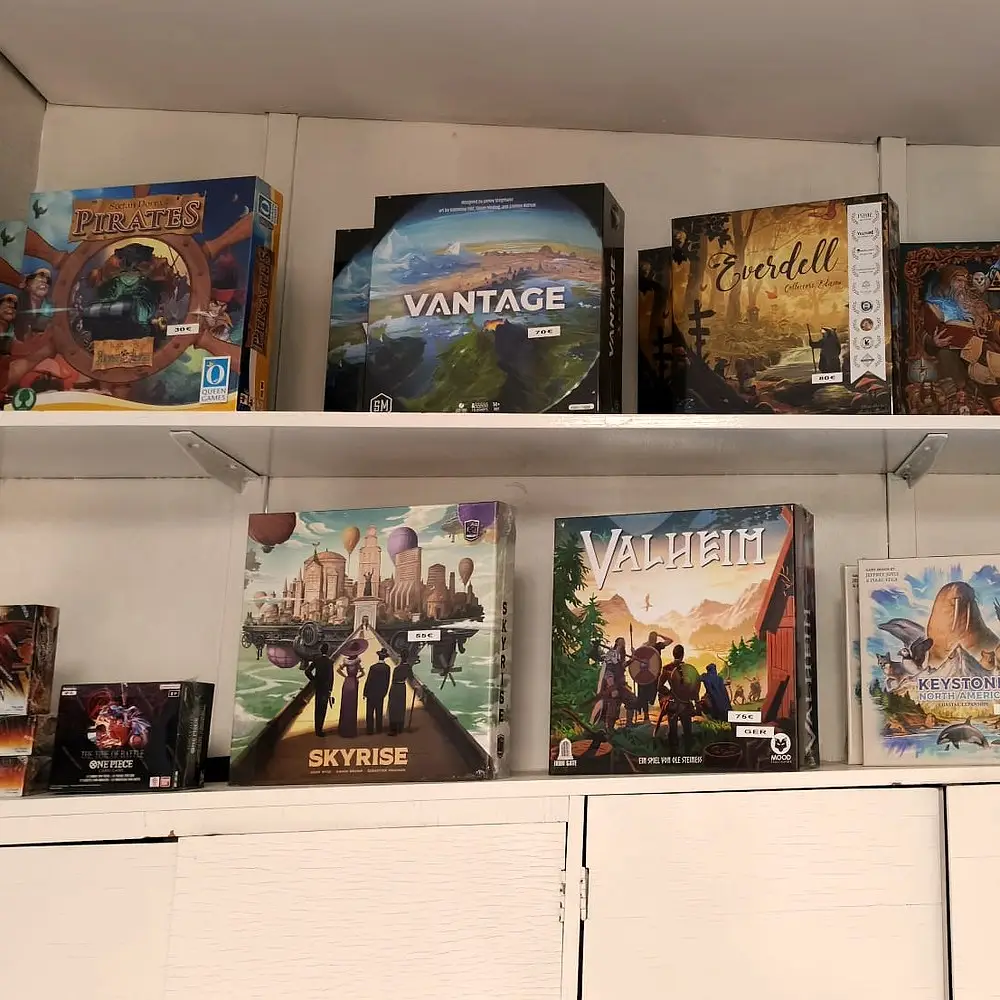 Board game shelves at Card Board Kingdom.